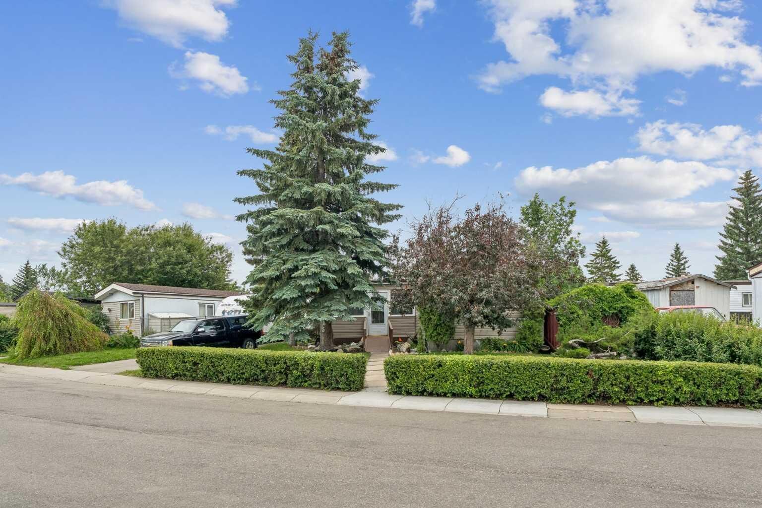 Property Photo: 165 Spring Dale Circle SE AB T4A 1P4