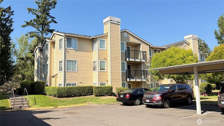 Property Photo:  28704  18th Avenue S V102  WA 98003 