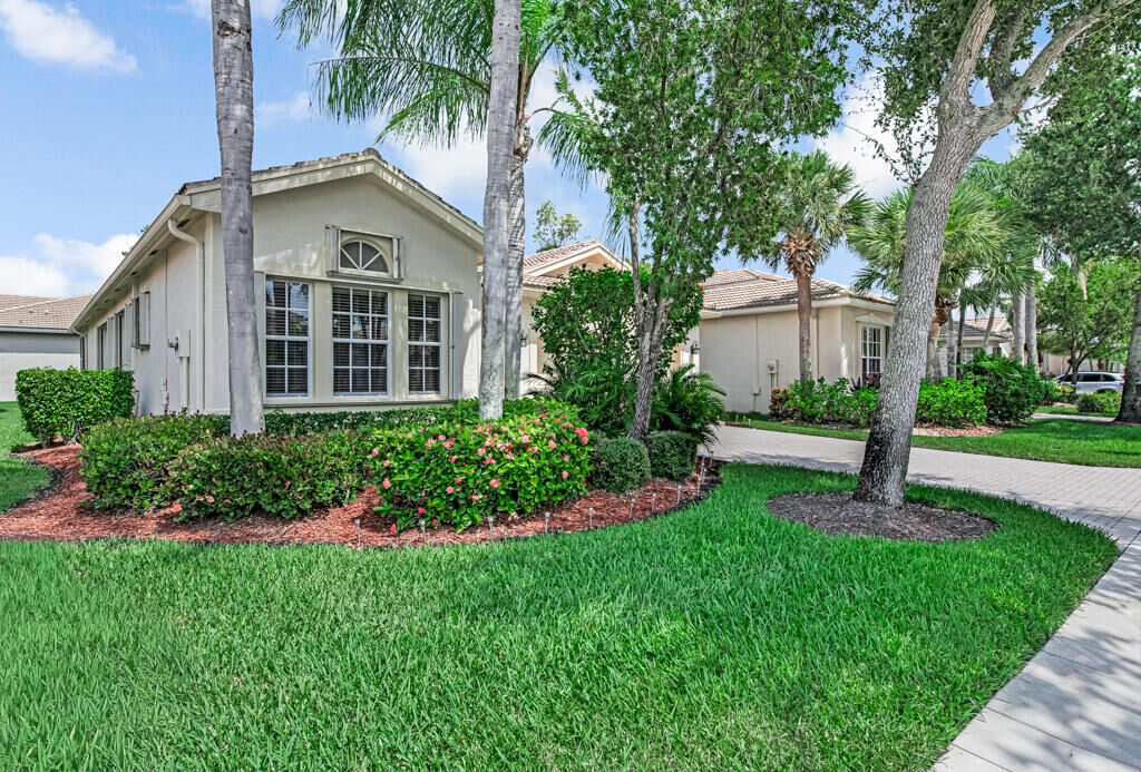 Property Photo:  7718 Ocean Sunset Drive  FL 33467 