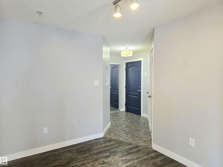 Property Photo: 155 Edwards Drive SW 105 AB T6X 1N6