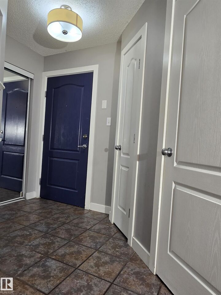 Property Photo: 155 Edwards Drive SW 105 AB T6X 1N6