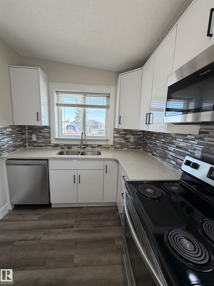 Property Photo: 7604 7606 75 Street NW AB T6C 2E9