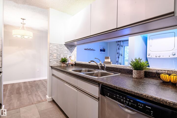 Property Photo: 10636 120 Street NW 237 AB T5H 4L5