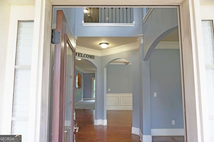 Property Photo: 5669 Woodland Greens Road GA 30135