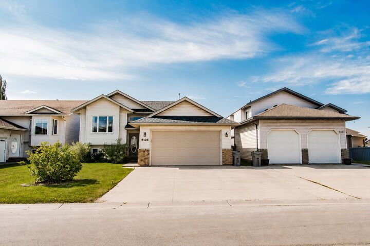 Property Photo: 9125 129 Avenue AB T8X 1R5