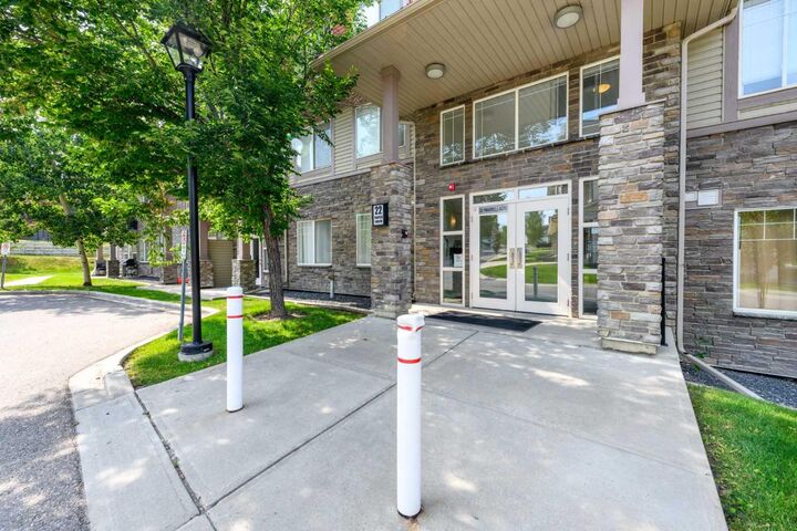 Property Photo: 22 Panatella Road NW 108 AB T3K 0V4