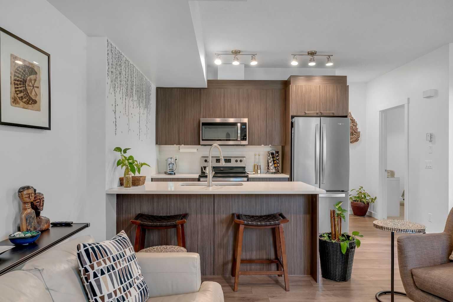 Property Photo: 300 Marina Drive 236 AB T1X 0P6