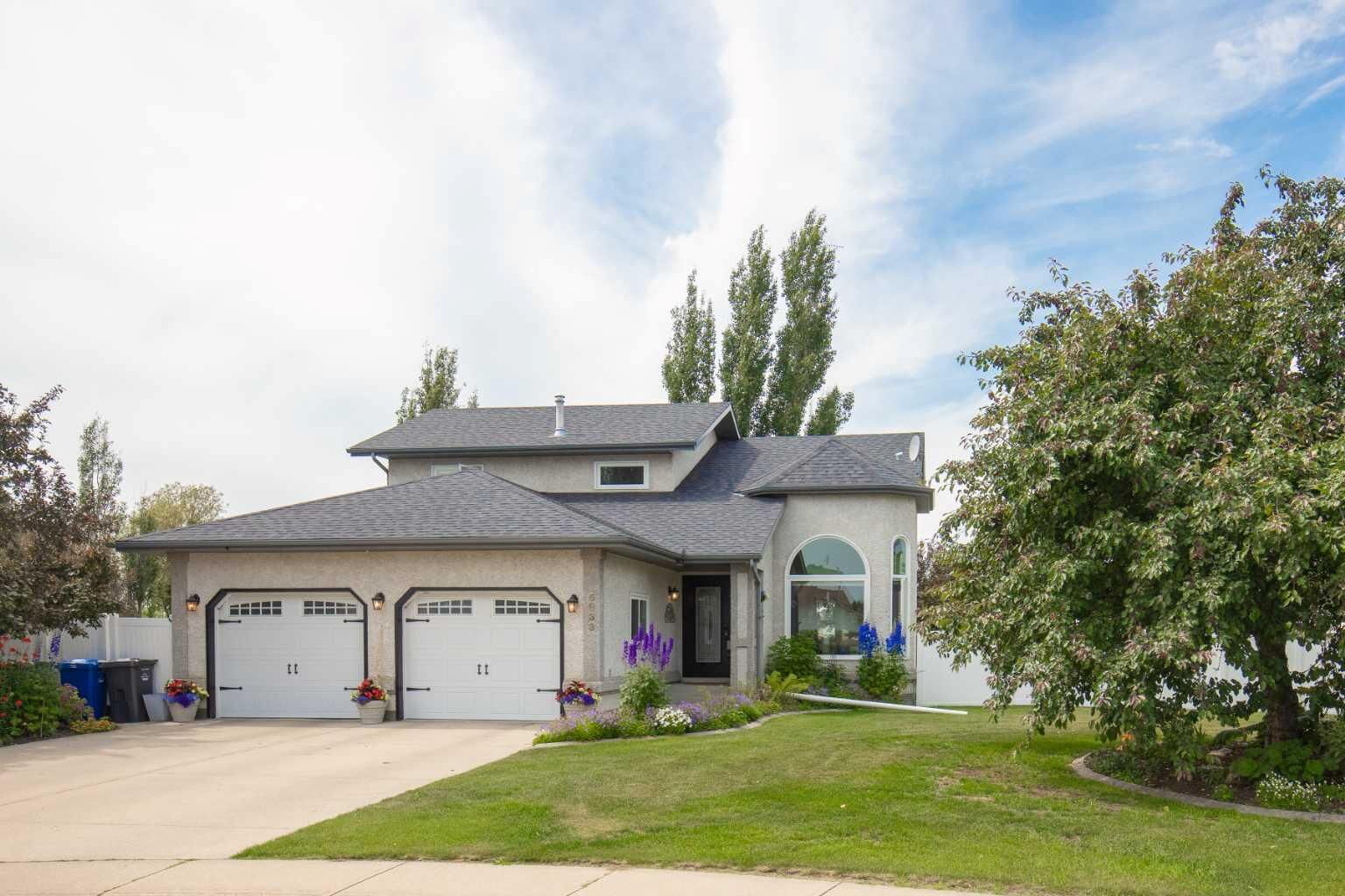 Property Photo: 5933 45 Street Crescent Street Crescent AB T4G 1L4