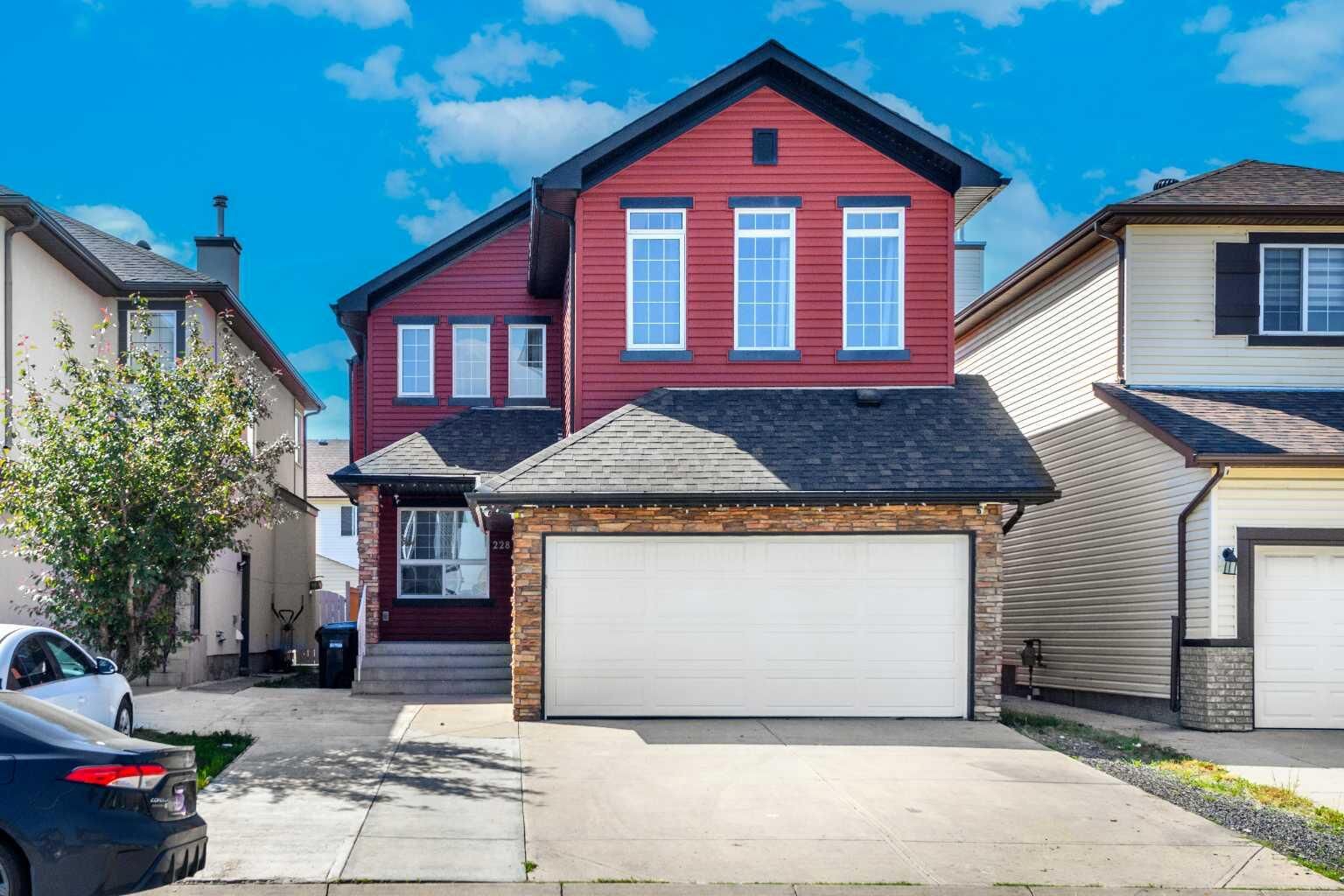 Property Photo: 228 Saddlecrest Way NE AB T3J 5N2
