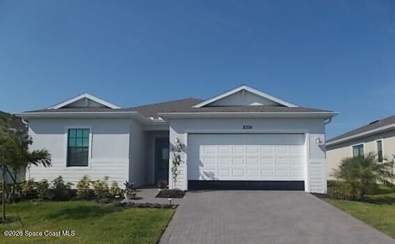 Property Photo: 8704 Alister Drive FL 32940