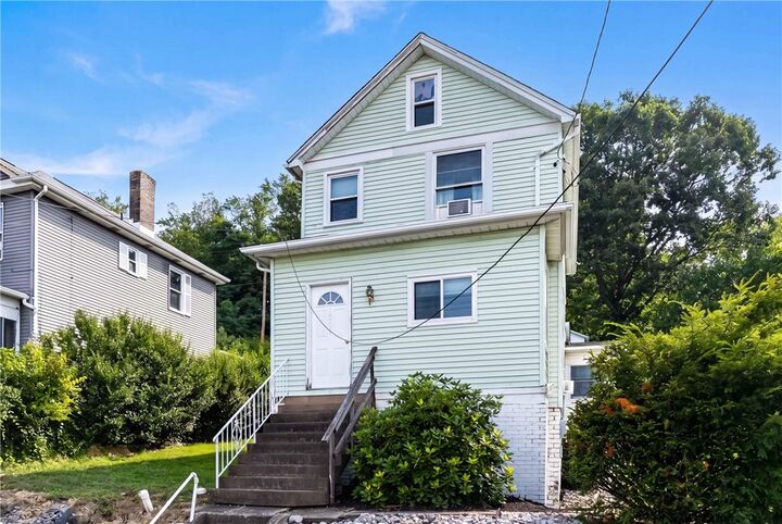 Property Photo:  1305 4th Ave  PA 15027 