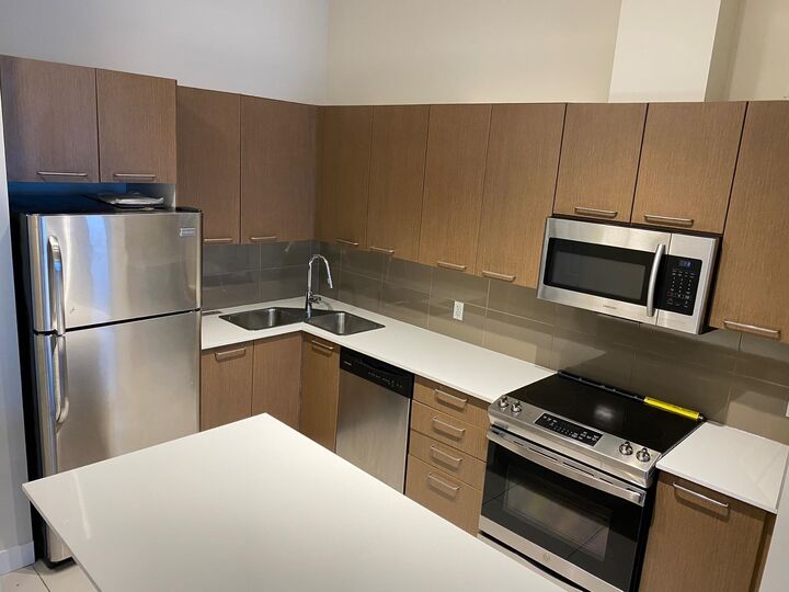Property Photo:  10822 City Parkway 404  BC V3T 5X9 