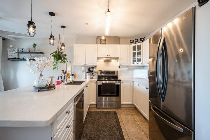 6390 196 Street 408 — photo 1