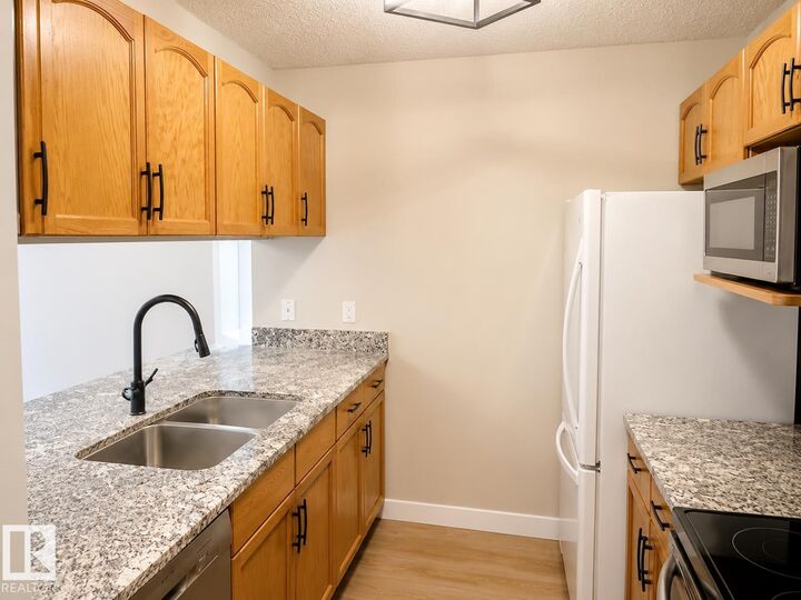 Property Photo:  17447 98A Avenue NW 329  AB T5T 6M4 