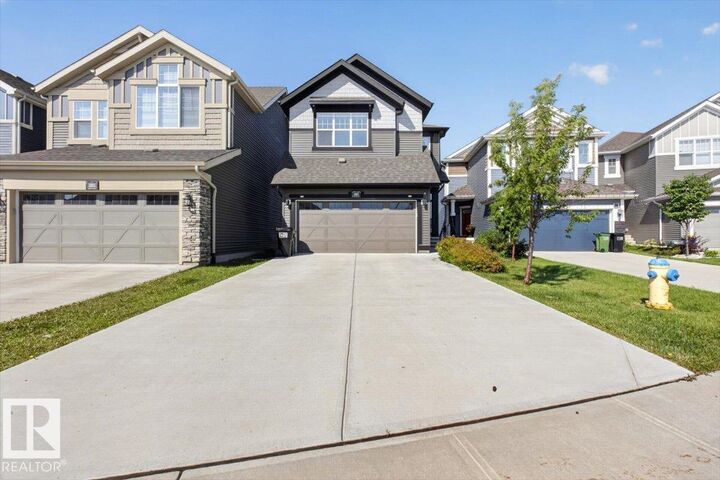 Property Photo: 3805 Cherry Loop SW AB T6X 2K7