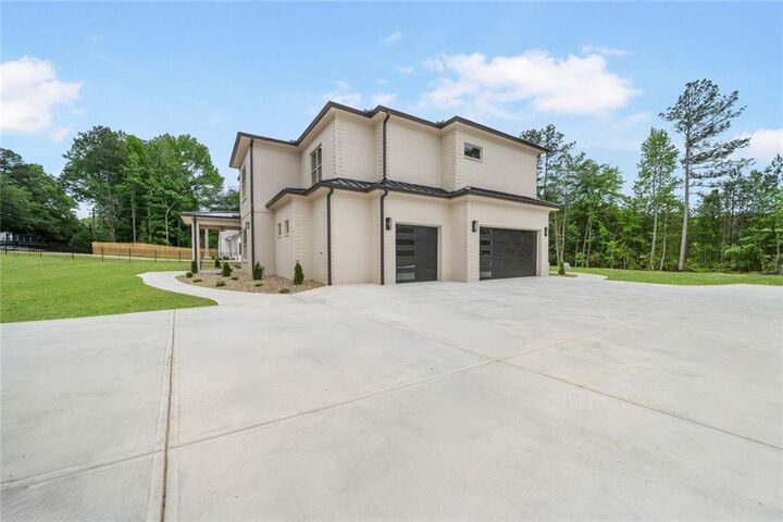 Property Photo: 210 Simonton Road SW GA 30046