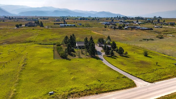 Property Photo:  6895 Deschamps Lane  MT 59808 