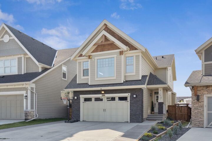Property Photo:  206 Riviera View  AB T4C 0Z2 