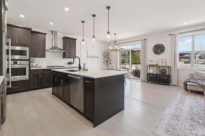 Property Photo: 206 Riviera View AB T4C 0Z2