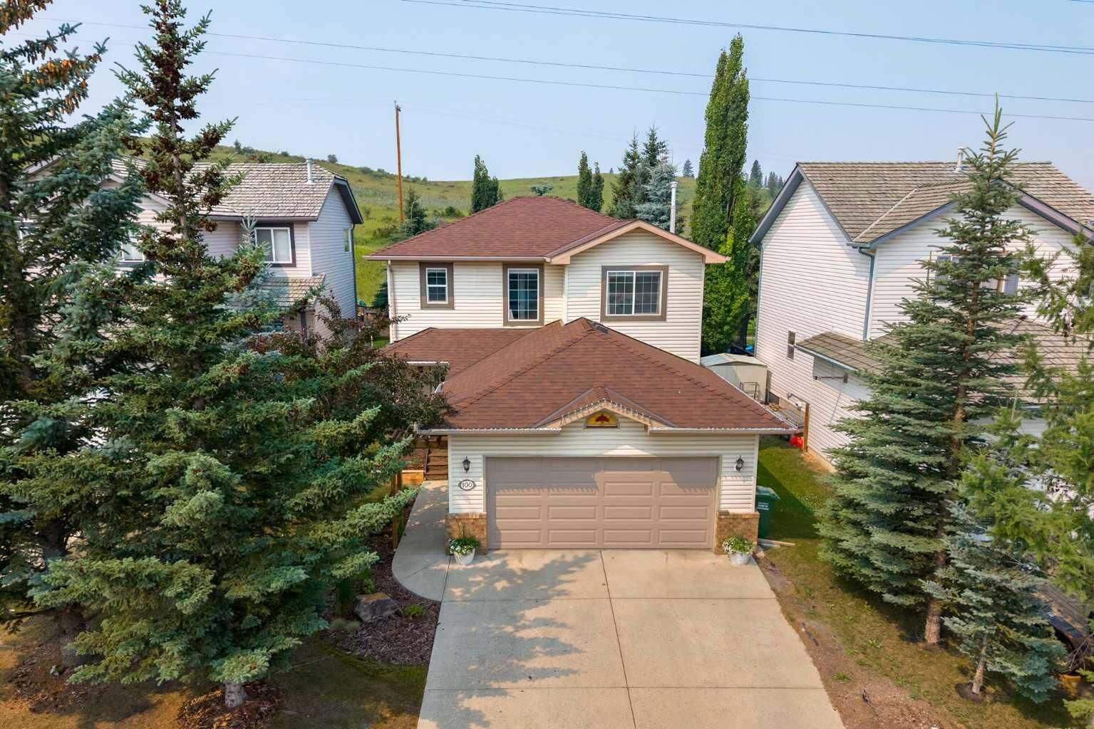 Property Photo:  100 Bow Ridge Crescent  AB T4C 1V2 
