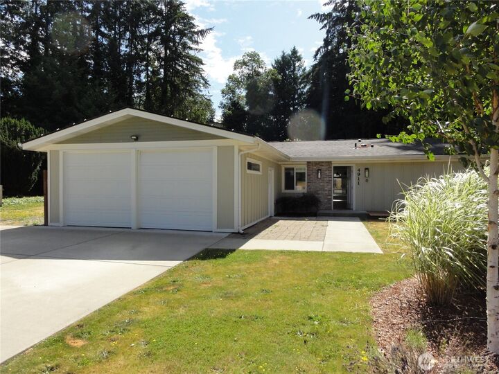 Property Photo:  4911  64th Avenue W  WA 98467 