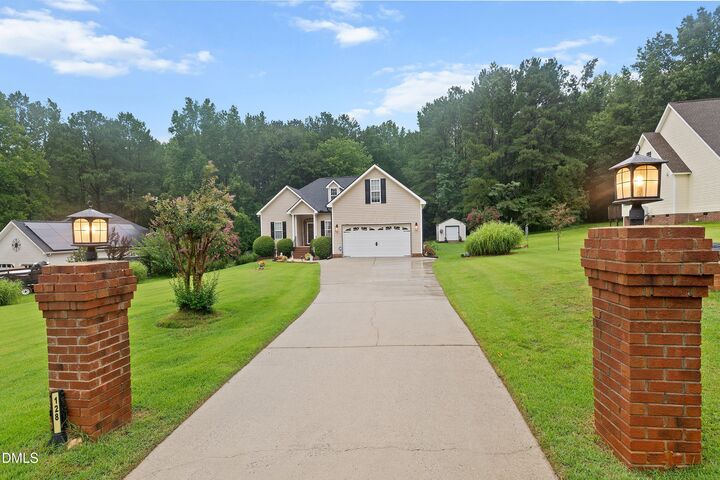 Property Photo:  128 Redbud Drive  NC 27520 