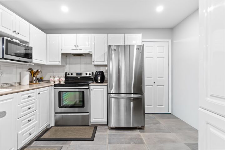 Property Photo: 12125 75A Avenue 105 BC V3W 1B9