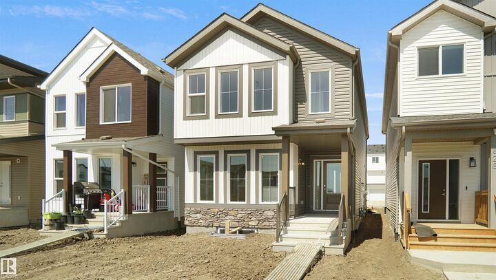 Property Photo:  7387 Keeler Crescent SW  AB T6W 4J9 
