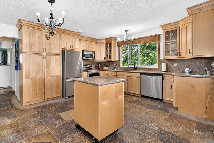 Property Photo: 350 Silver Ridge Crescent NW AB T3B 3T5