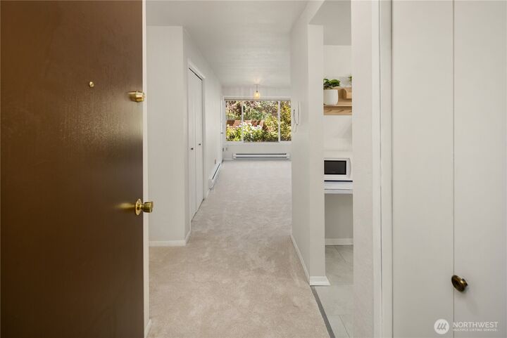 Property Photo:  6055  35th Avenue SW 107  WA 98126 