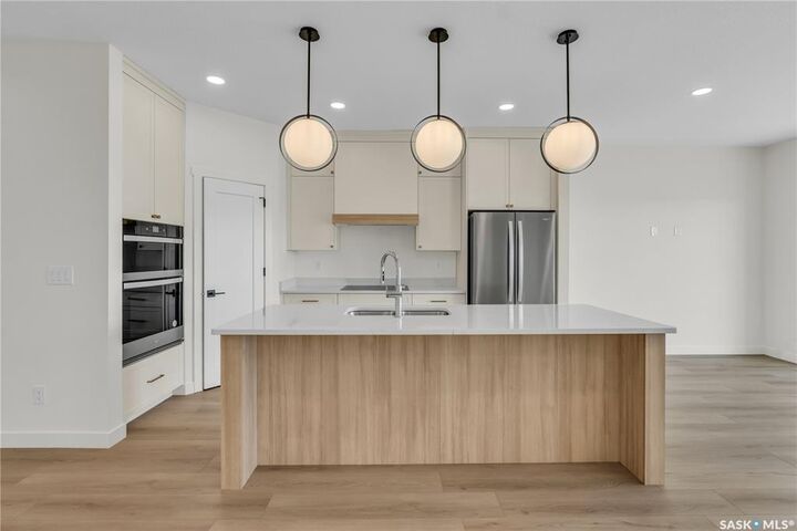Property Photo:  720 Brighton Boulevard 10  SK S7V 1X1 