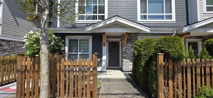 Property Photo:  19753 55A Avenue Avenue 1  BC V3A 0J9 