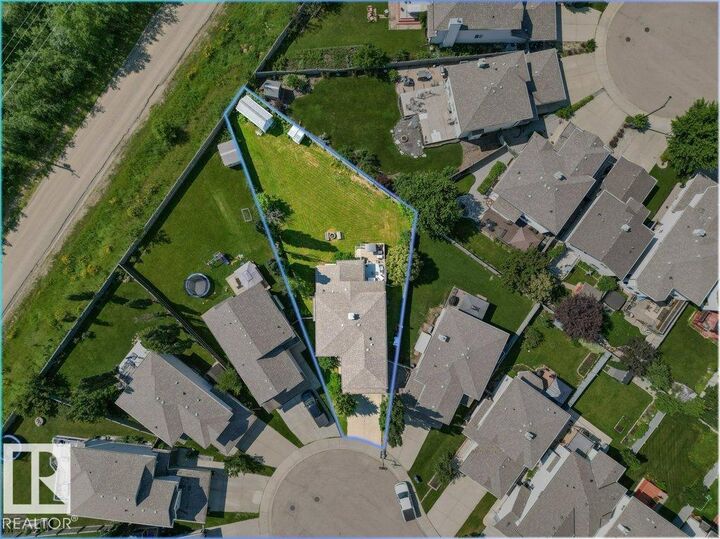 Property Photo: 4512 210 Street NW AB T6M 0G5