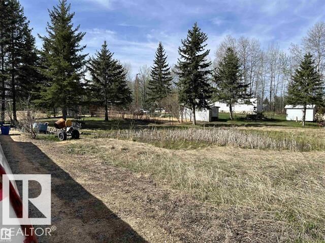 Property Photo:  210 55504 Nikoodi Road  AB T0E 0X0 