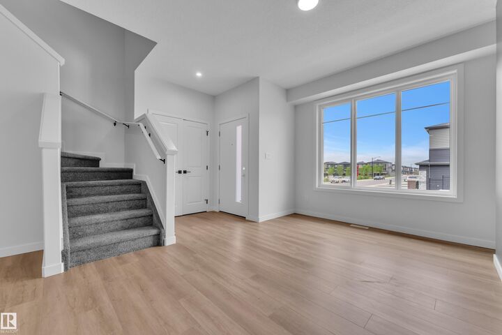 Property Photo: 6371 King Wynd SW AB T6W 5J3