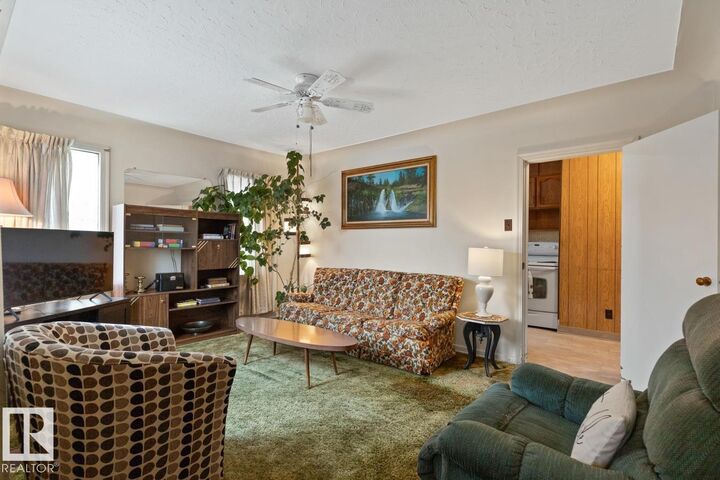 Property Photo:  12044 50 Street NW  AB T5W 3C4 