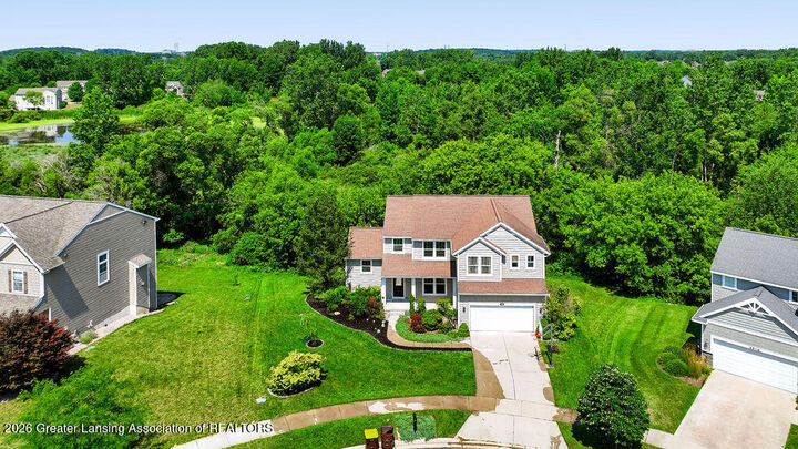Property Photo:  2518 Lupine Court  MI 48864 