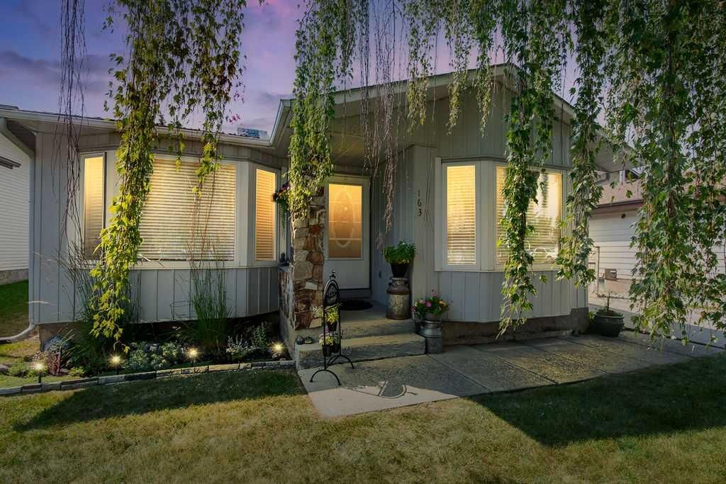 Property Photo: 163 Woodburn Crescent AB T1S 1L4