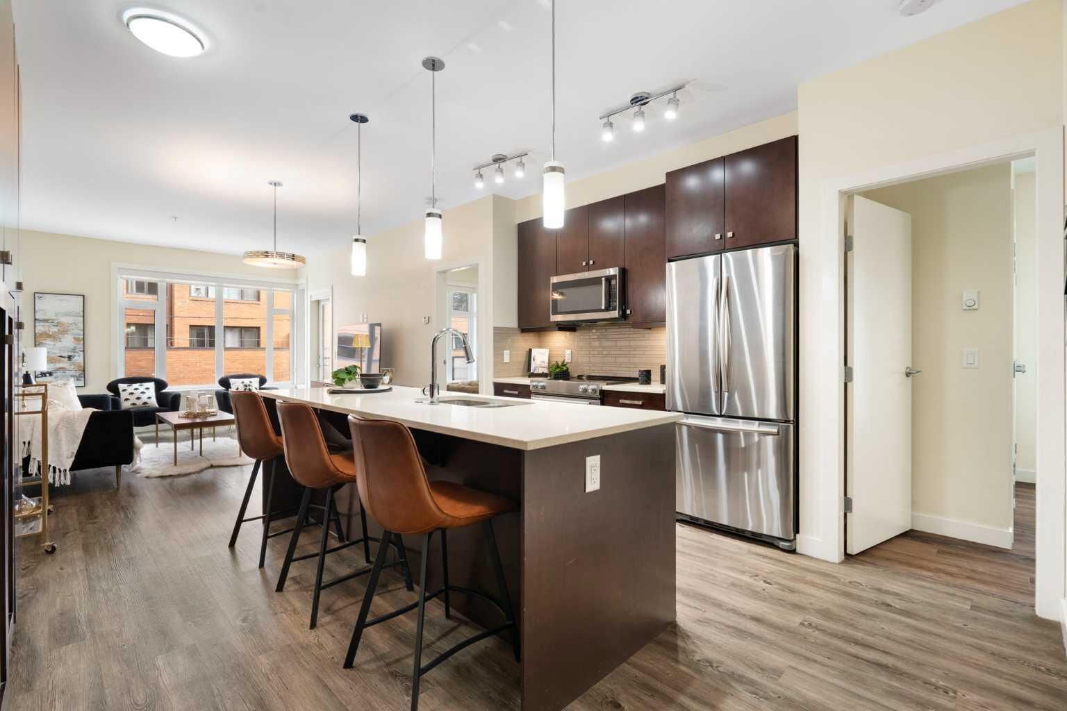 Property Photo: 1720 10 Street SW 209 AB T2T 3E8