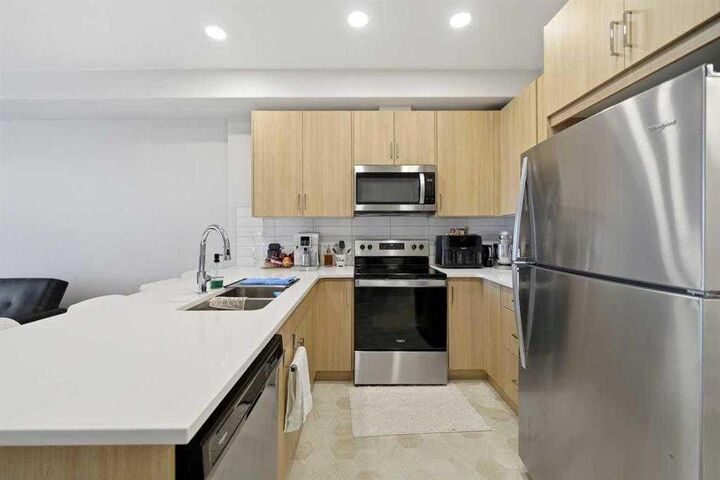 Property Photo: 55 Wolf Hollow Crescent SE 318 AB T2X 5K9