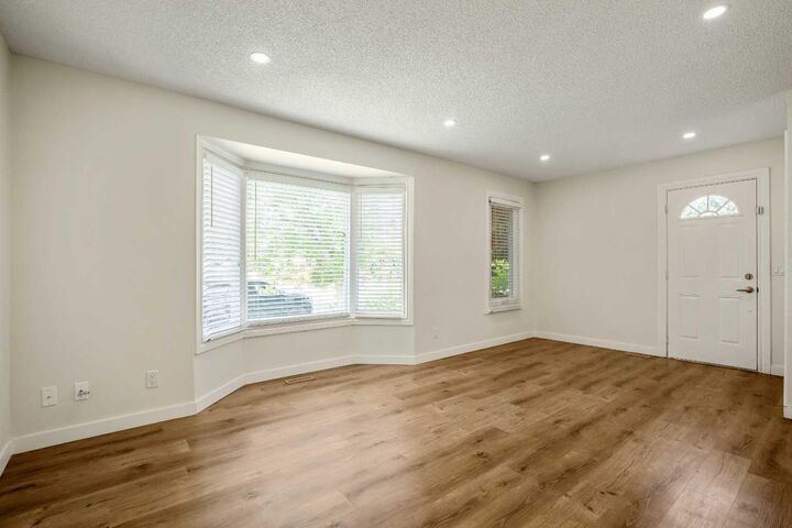 Property Photo: 610 Strathcona Drive SW AB T3H 1K4