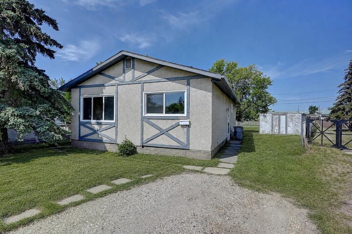 Property Photo:  11448 97 Street  AB T8V 3N2 