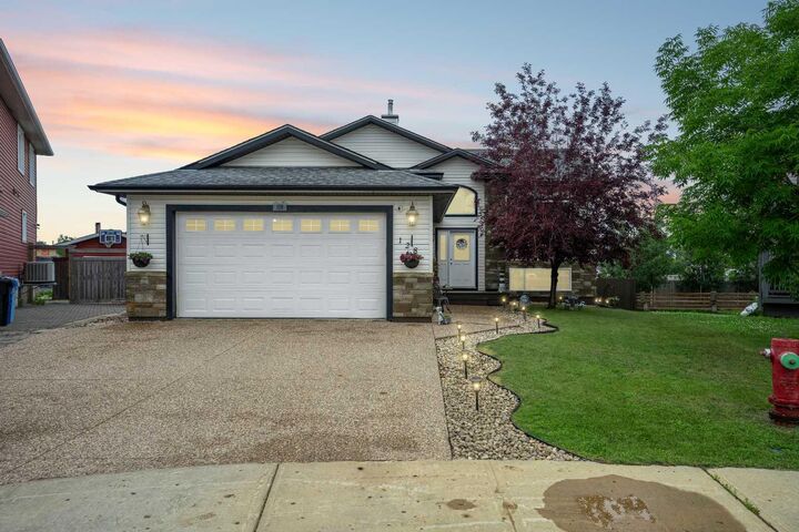 Property Photo:  128 Dogwood Lane  AB T9K 0G8 