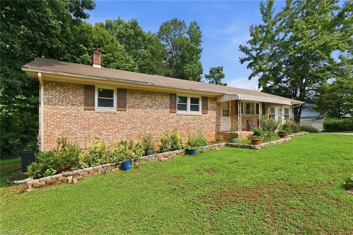 Property Photo:  5703 Summit Avenue  NC 27214 