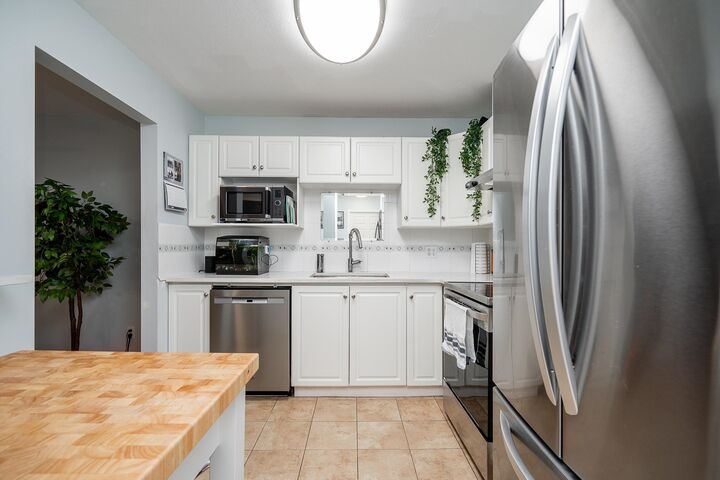 Property Photo:  12733 72 Avenue 212  BC V3W 2M7 