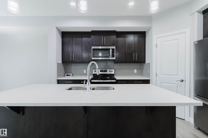 Property Photo: 6345 Cartmell Road SW AB T6W 4A3