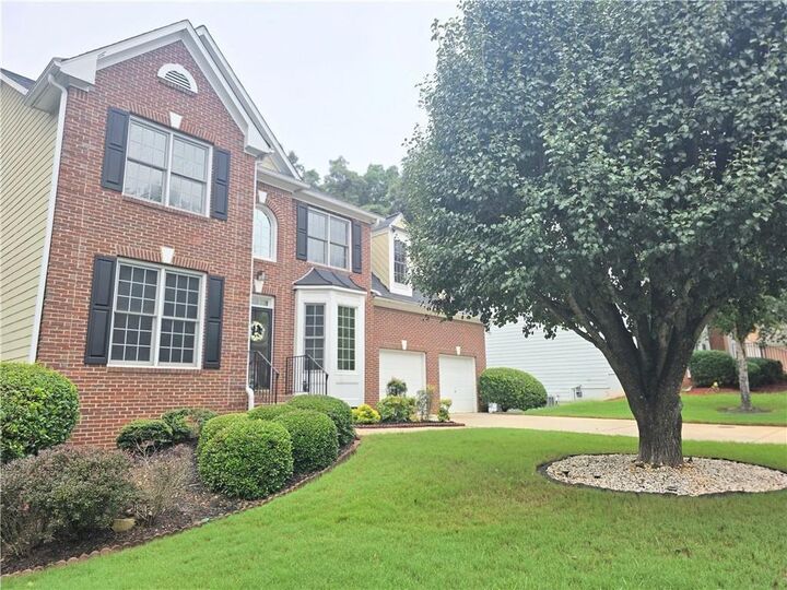 Property Photo: 6860 Deer Creek Trace GA 30087