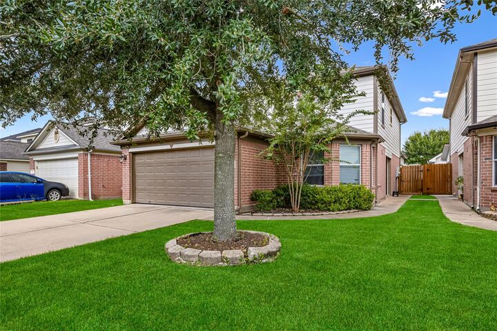 Property Photo: 5703 Basswood Dale Drive TX 77084