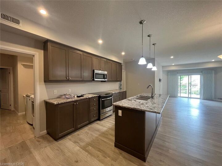 Property Photo:  206 Jessica Crescent A  ON N2R 0H8 