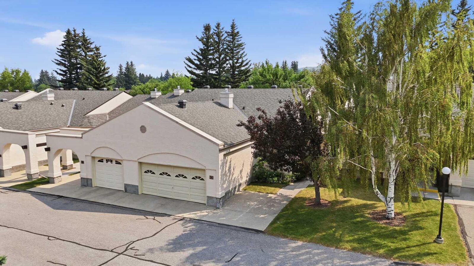 Property Photo: 30 Sandarac Circle NW AB T3K 3G7